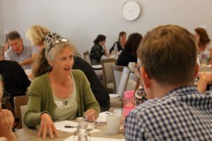 Female participant talking to session group