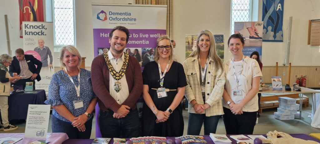 Members of Dementia Oxfordshire standing alongside the mayor of Witney