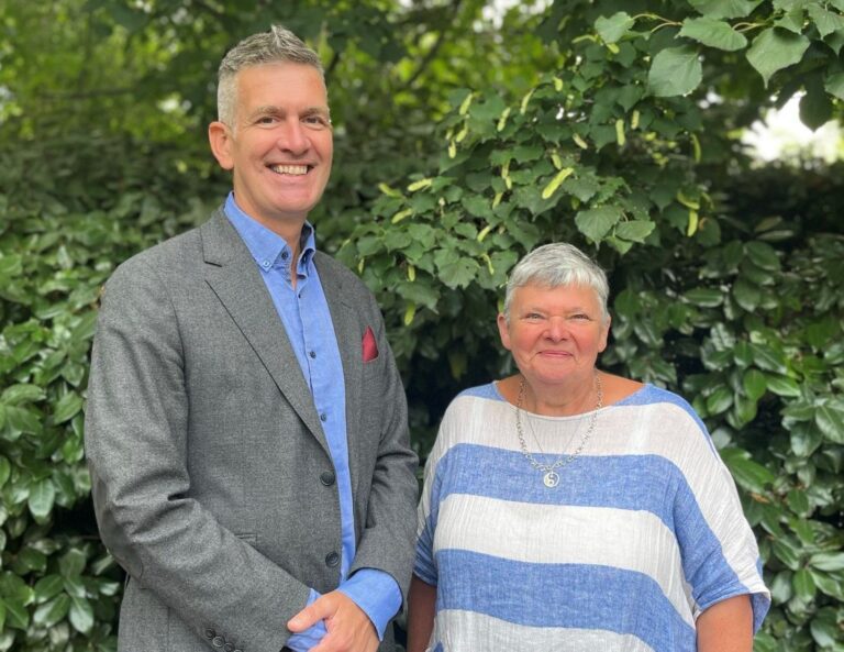 Paul and Penny smiling
