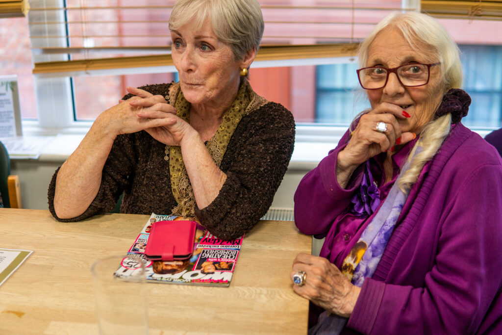 Two women sat at a table