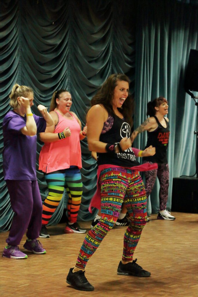 Zumba teacher on stage