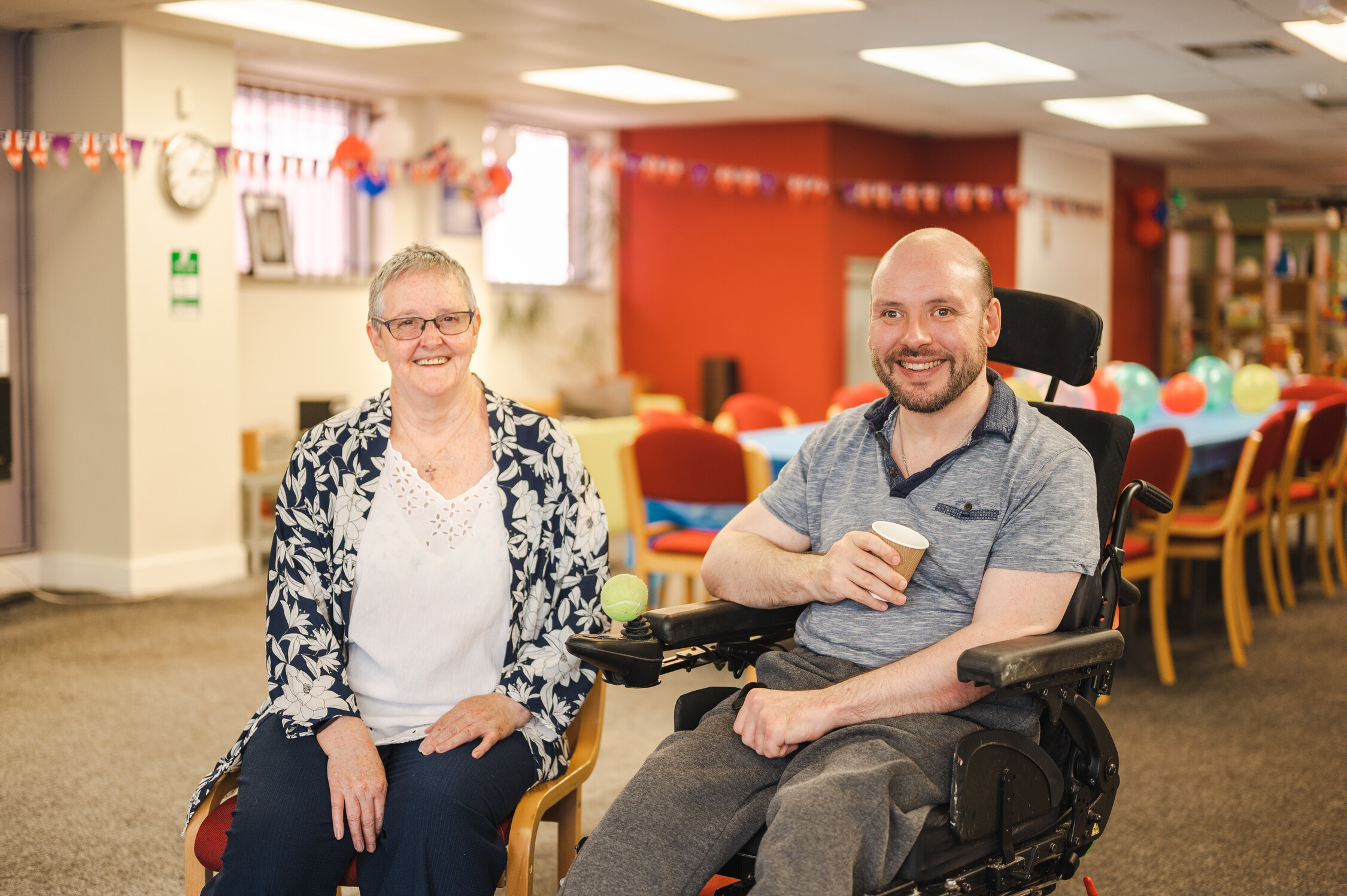 a man and woman drinking a cofee